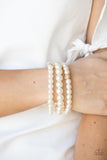 Here Comes The Heiress-Gold Stretch Bracelet-Paparazzi Accessories
